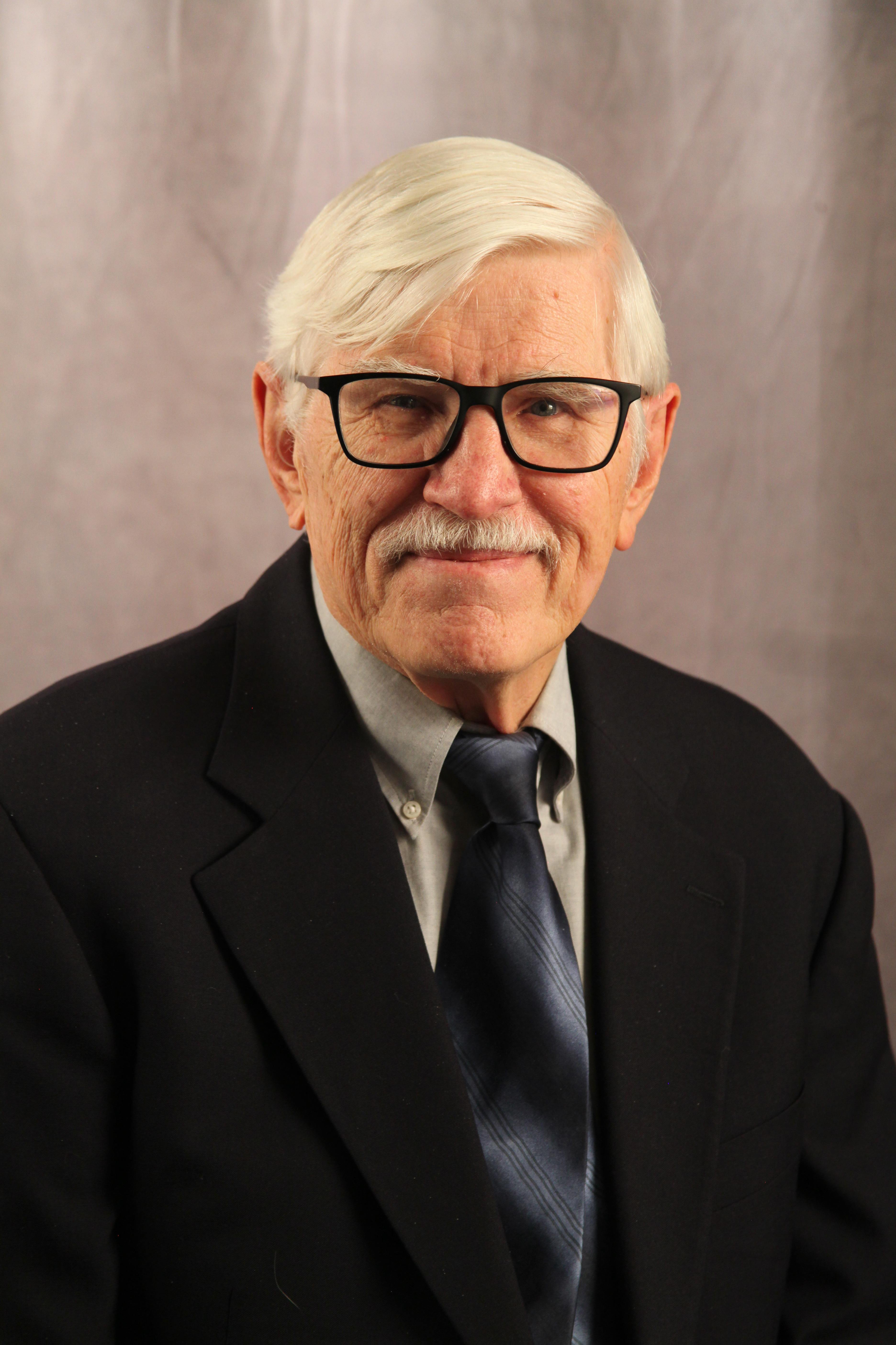 Dr. Ralph Hollis